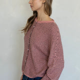Side view of Hailey cardigan in rose pin stripe lightweight knit relaxed fit