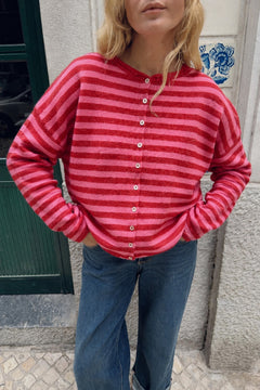 Model wearing the Hailey Red Combo striped cardigan styled with casual denim.