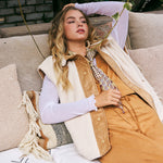 Harper Cozy Snap Vest in Ecru worn over a layered outfit, featuring a soft sherpa texture and relaxed fit for everyday styling