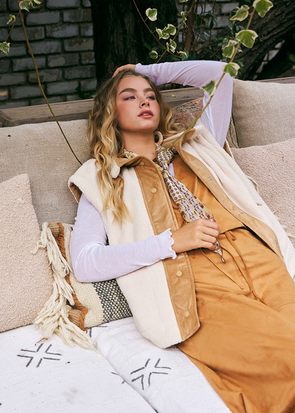 Harper Cozy Snap Vest in Ecru worn over a layered outfit, featuring a soft sherpa texture and relaxed fit for everyday styling