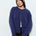 Woman wearing the Marley Harper Round-Neck Relaxed Cardigan in navy — lightweight knit with button-front closure and relaxed fit.
