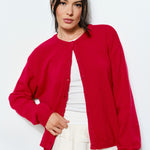 Harper Round-Neck Relaxed Cardigan in red styled casually with jeans — soft, cozy women’s layering piece.