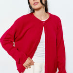 Woman wearing the Marley Harper Round-Neck Relaxed Cardigan in red - lightweight knit with button-front design and relaxed fit.