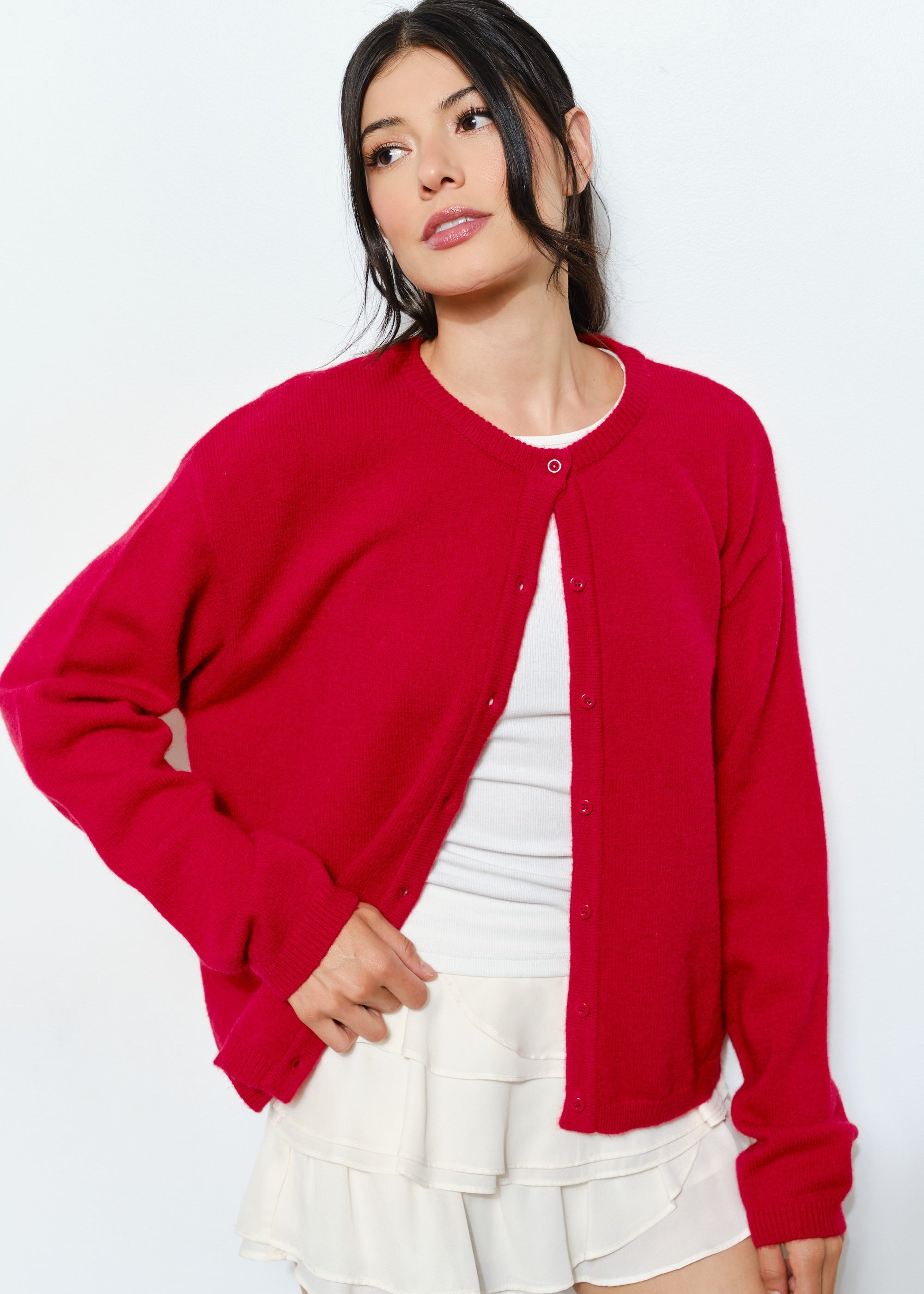 Woman wearing the Marley Harper Round-Neck Relaxed Cardigan in red - lightweight knit with button-front design and relaxed fit.