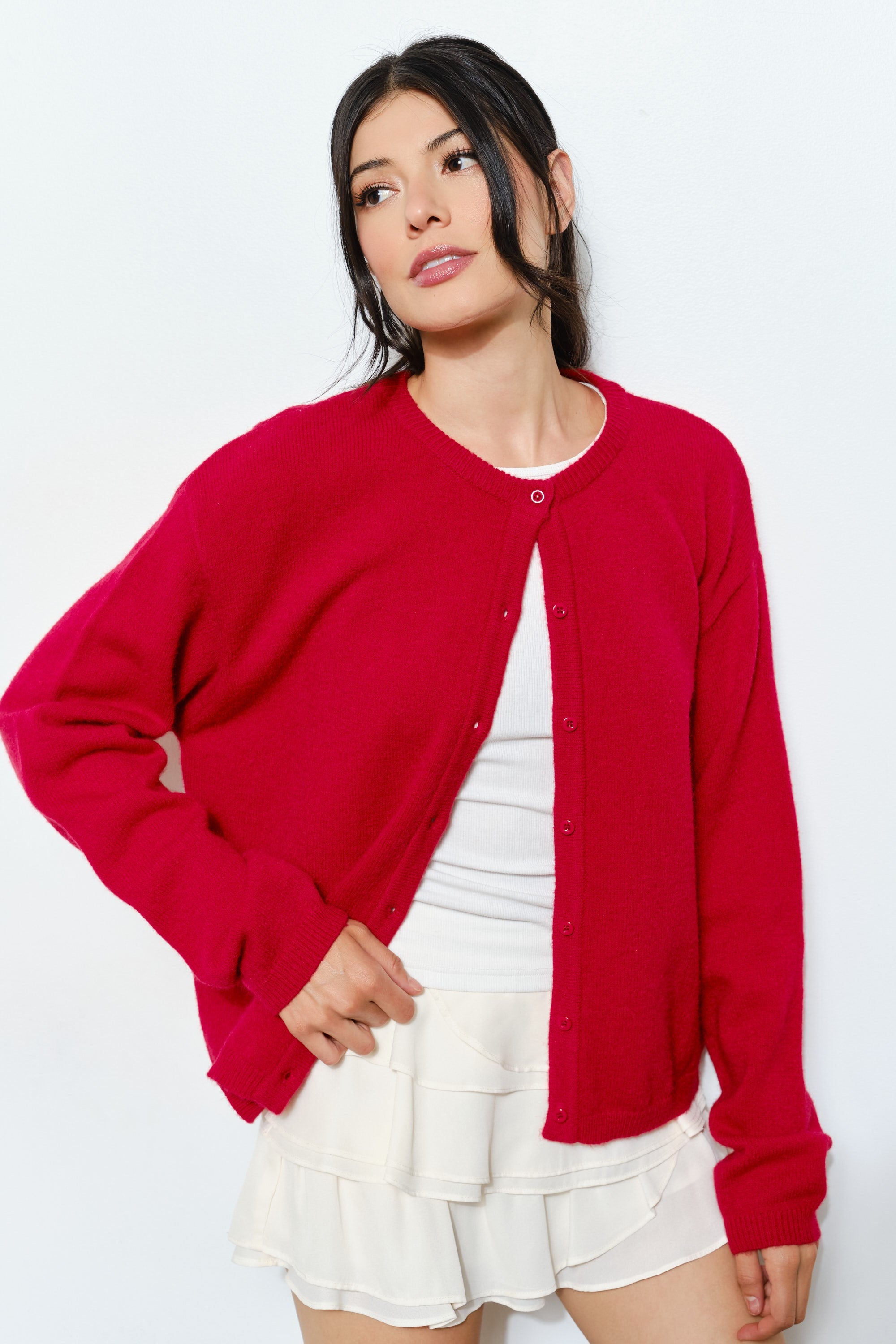 Woman wearing the Marley Harper Round-Neck Relaxed Cardigan in red - lightweight knit with button-front design and relaxed fit.