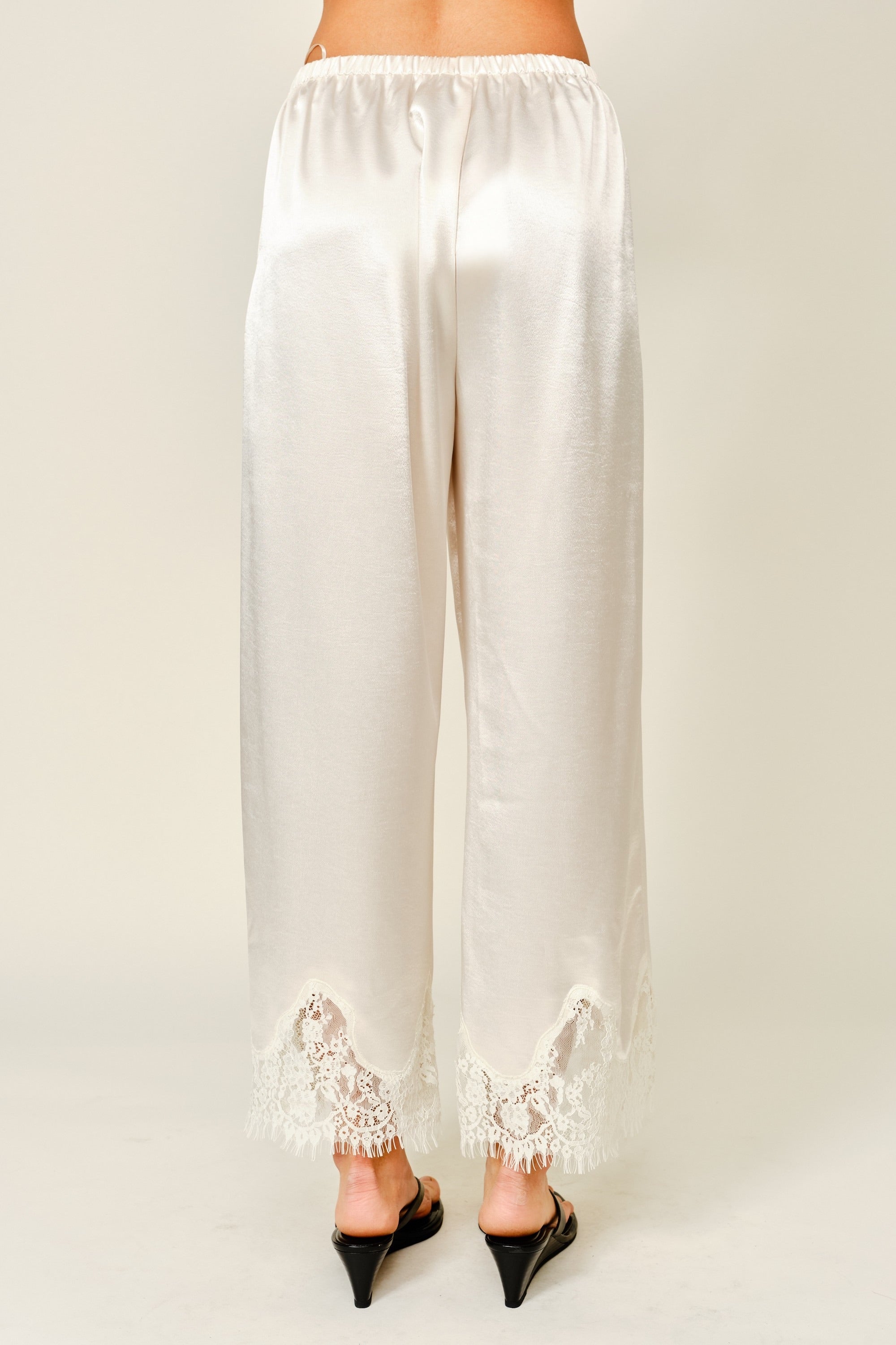 Back view of Heirloom Satin Lace Wide-Leg Pants in champagne with relaxed wide-leg fit