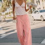Irene Striped Wide Leg Pants in Blush styled in a casual everyday outfit with a relaxed wide leg fit.