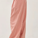 Side view of the Irene Striped Wide Leg Pants in Blush with a relaxed wide leg silhouette and soft striped cotton-linen fabric.
