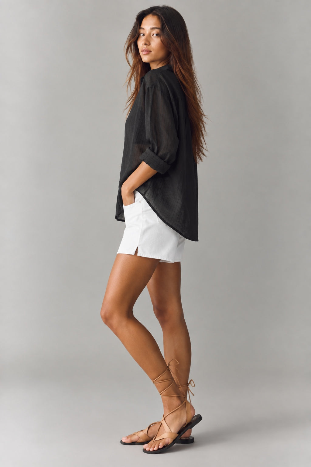 Side view of Isabella relaxed sheer pinstripe shirt in charcoal black