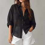 Isabella sheer pinstripe button-down shirt in charcoal black, front outfit view