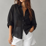 Isabella sheer pinstripe button-down shirt in charcoal black, front outfit view