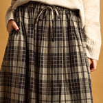 Close-up of Ives plaid maxi skirt with adjustable elastic drawstring waist