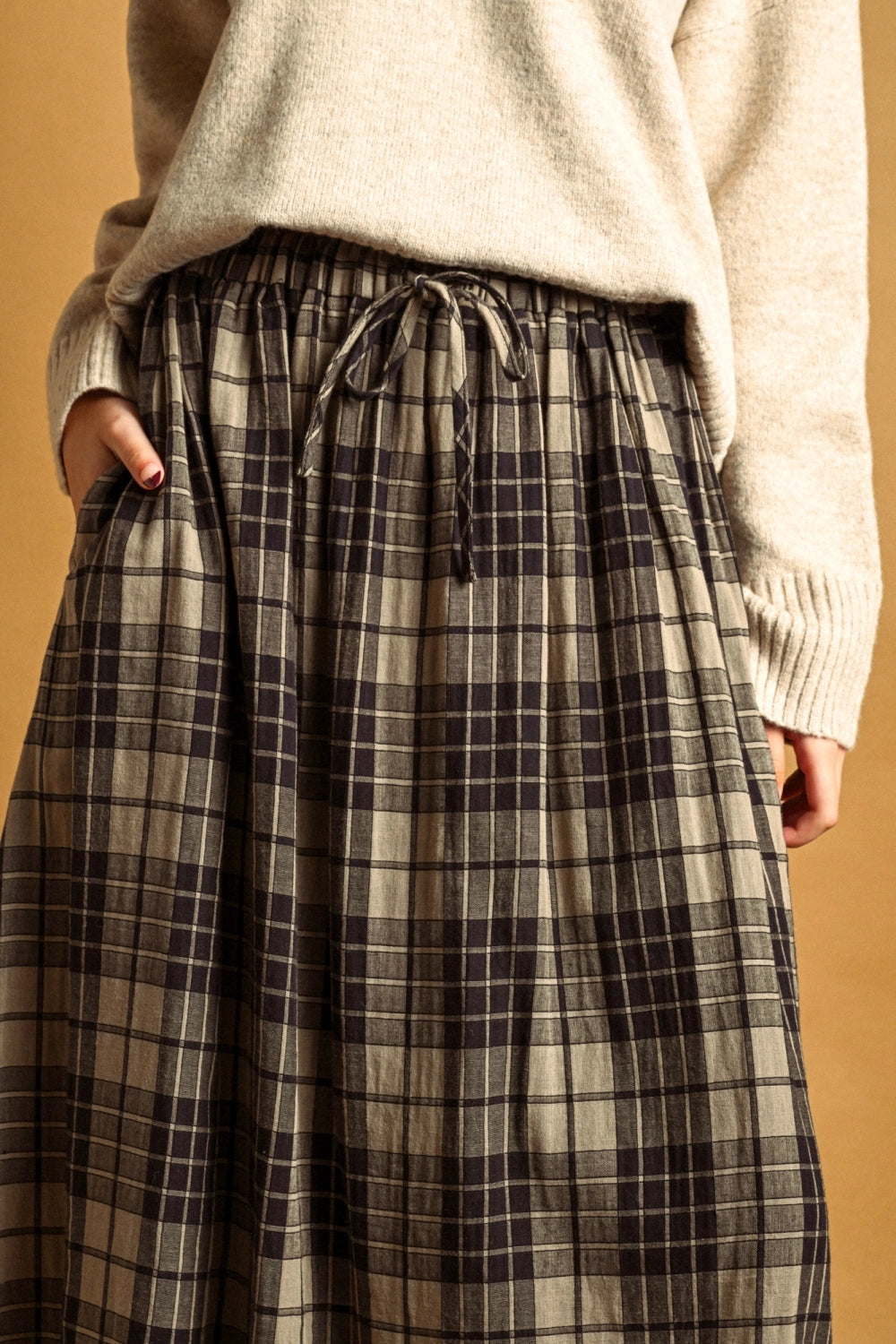 Close-up of Ives plaid maxi skirt with adjustable elastic drawstring waist