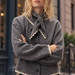 Model wearing a heather grey lace-trim cardigan and matching bandana scarf with jeans