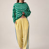full outfit - model is wearing  butter yellow Landon Track Pants showing elastic waist