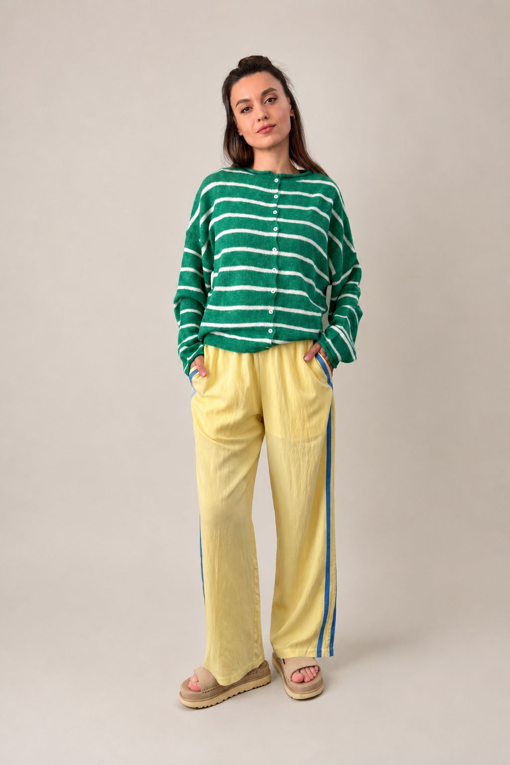 Full outfit of butter yellow Landon Track Pants showing the blue stripe detail and relaxed pull-on fit.
