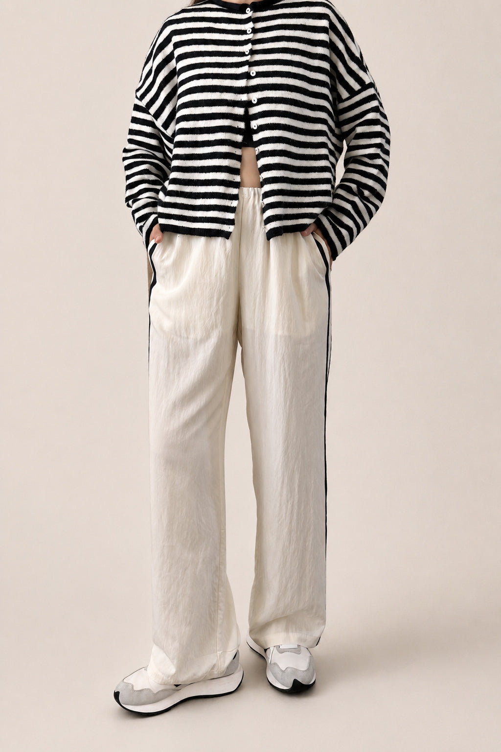 Landon Side Stripe Track Pants in ivory with relaxed wide leg fit, elastic waist, and blue side stripe detail - front view