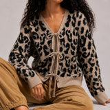 Front view of the mocha black leopard print cardigan sweater with long sleeves and a relaxed fit