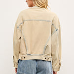 Back view of light wash casual denim jacket with relaxed bomber shape