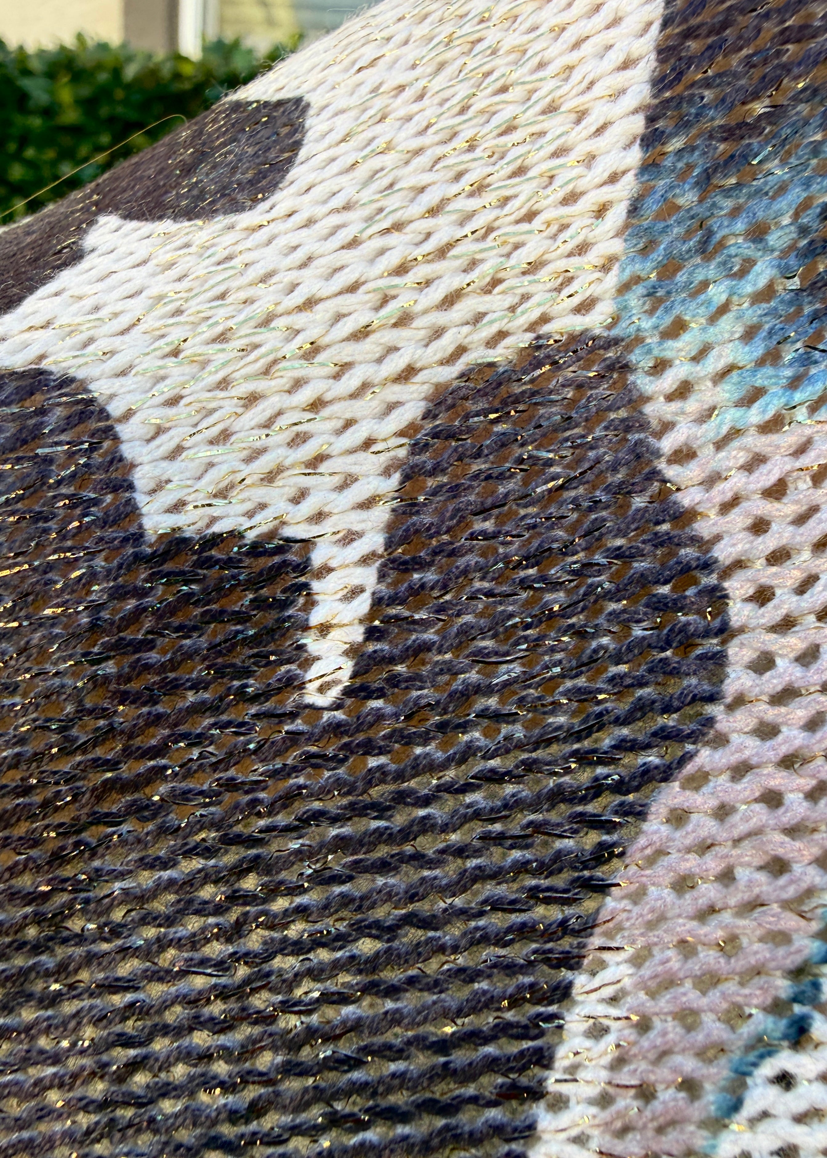 Close-up of knit fabric texture and print detail