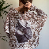 Back view of the batwing sweater showing relaxed oversized silhouette