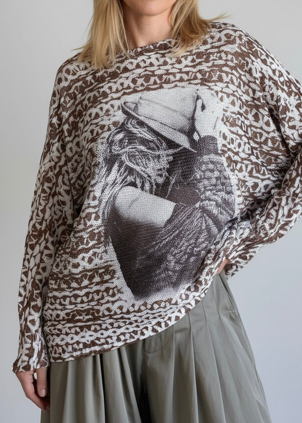 Close-up front detail highlighting the cowgirl print and soft knit texture