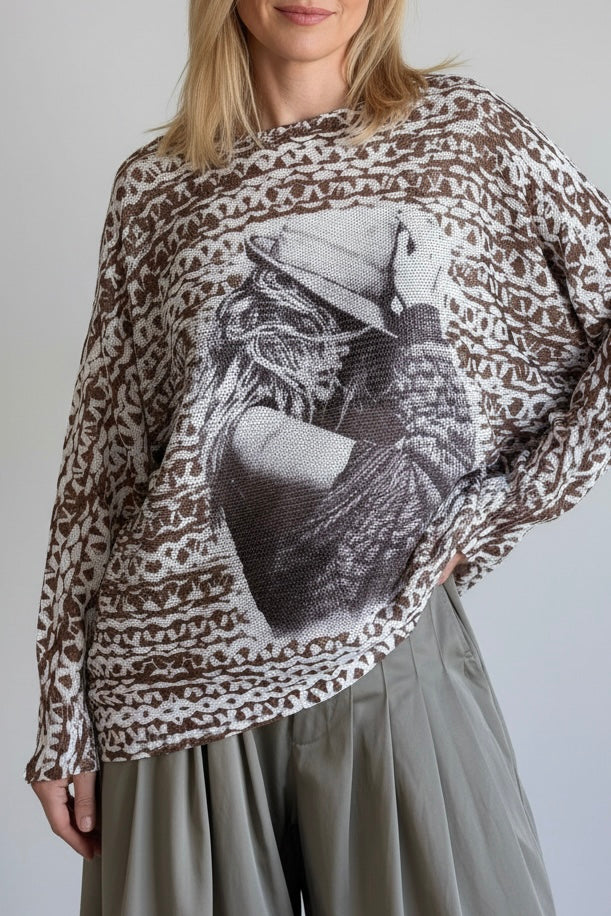 Close-up front detail highlighting the cowgirl print and soft knit texture