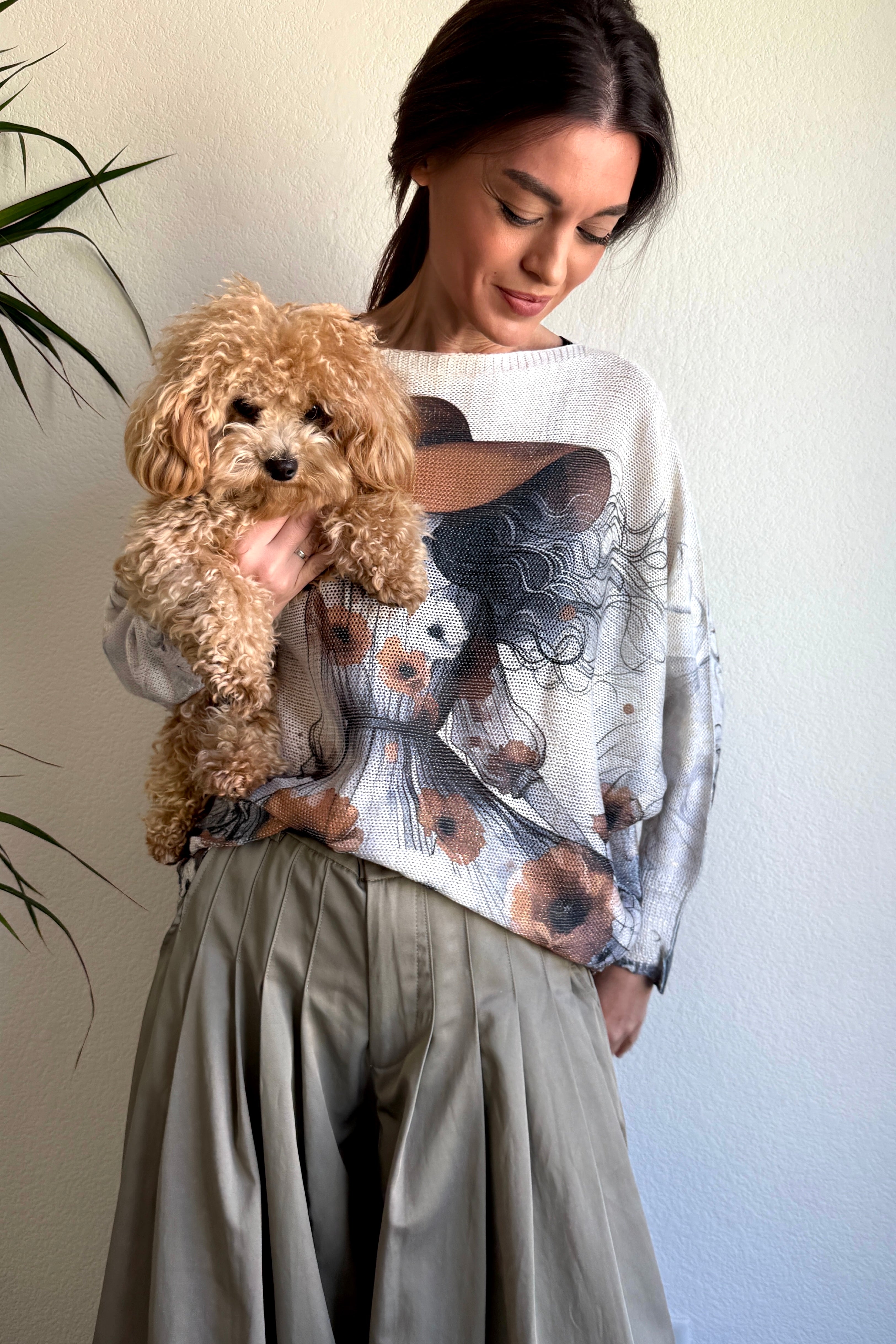 Relaxed lifestyle photo of the Lady in Hat batwing sweater showing movement and comfort