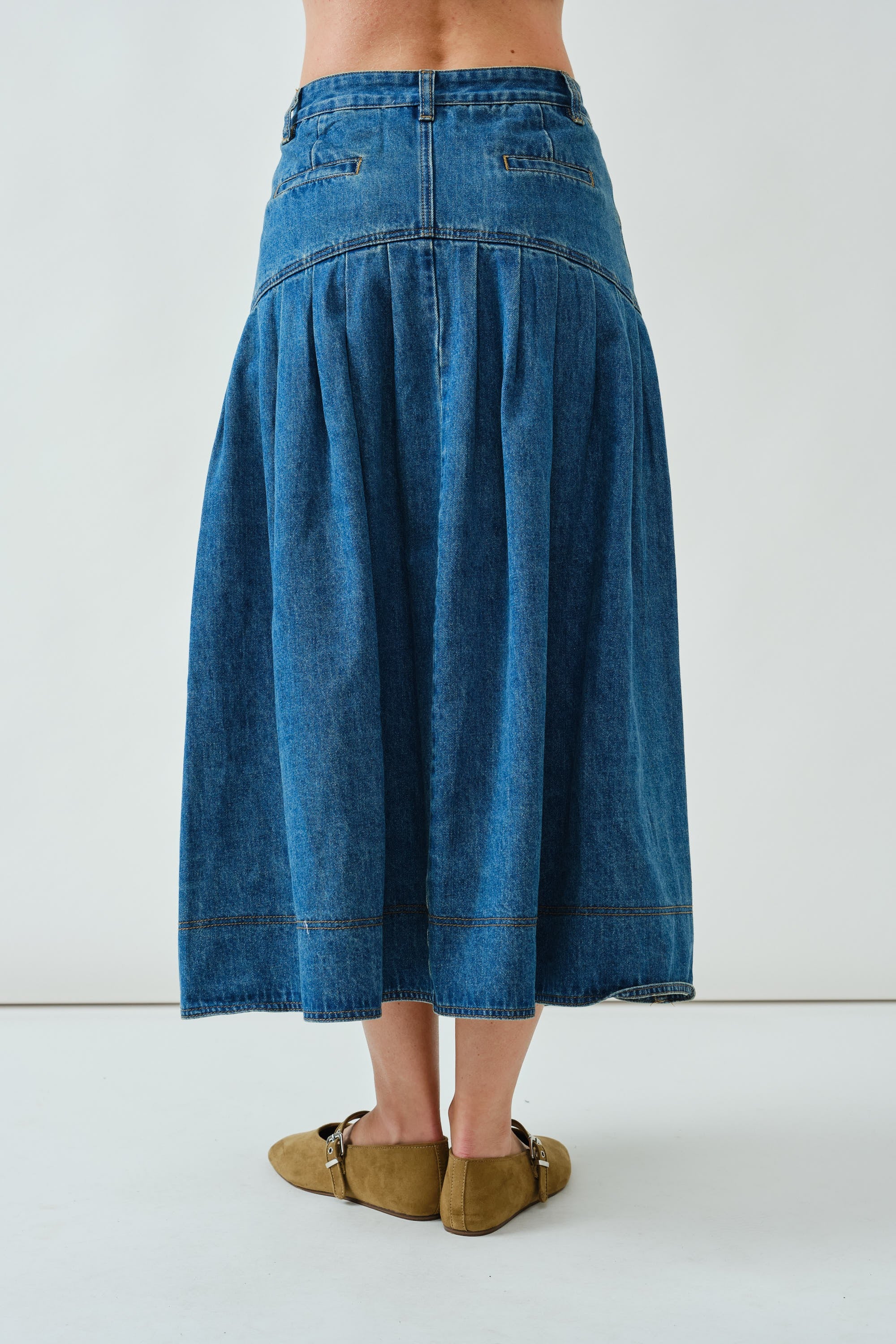 Full back view of the Lotus Basque Denim Midi Skirt