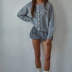 Lucas Button-Down Knit Cardigan in heather grey worn with gingham shorts, full body front view