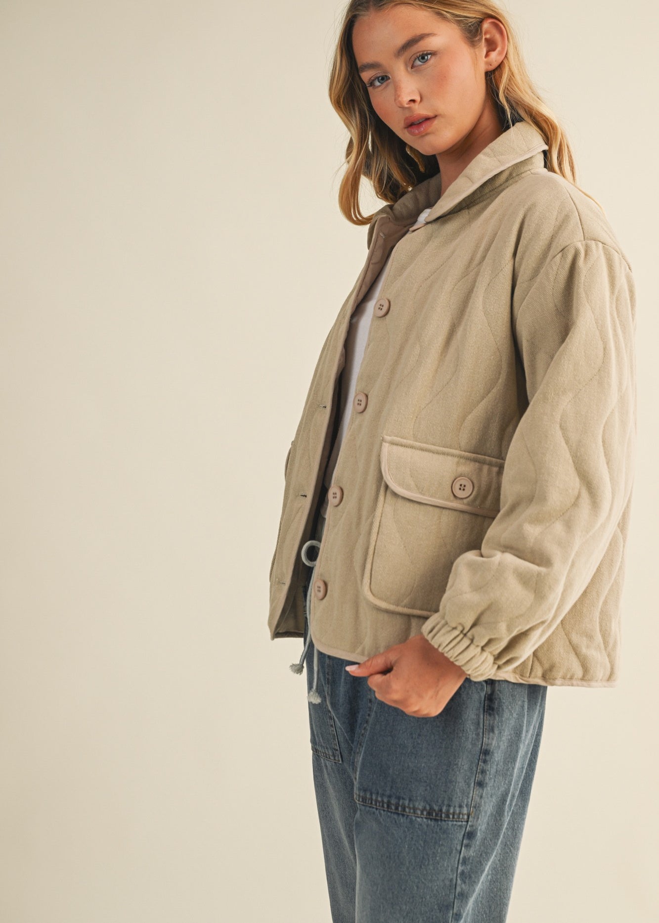 Side view of the Magnolia Wave Quilted Cotton Jacket in wheat highlighting relaxed fit