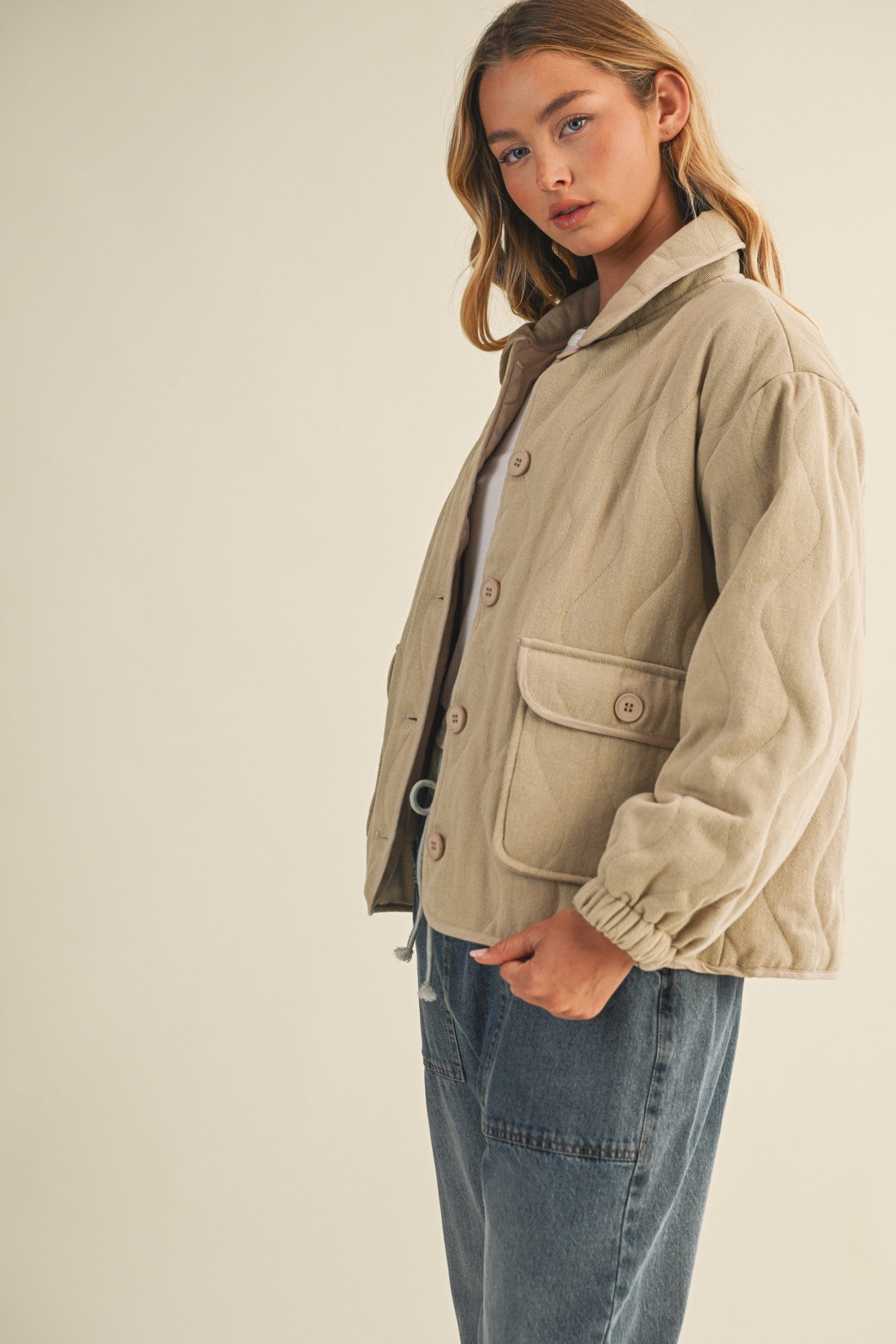 Side view of the Magnolia Wave Quilted Cotton Jacket in wheat highlighting relaxed fit