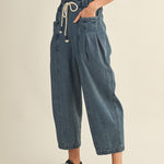 Side view of Margo pleated pull-on denim pants showing relaxed fit