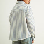 Marina blue striped button-down shirt with relaxed fit and dropped shoulders back