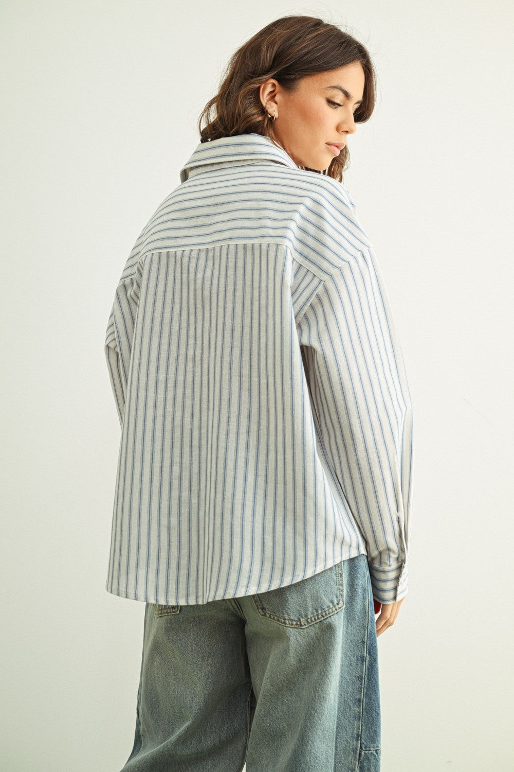 Marina blue striped button-down shirt with relaxed fit and dropped shoulders back
