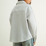 Marina blue striped button-down shirt with relaxed fit and dropped shoulders back
