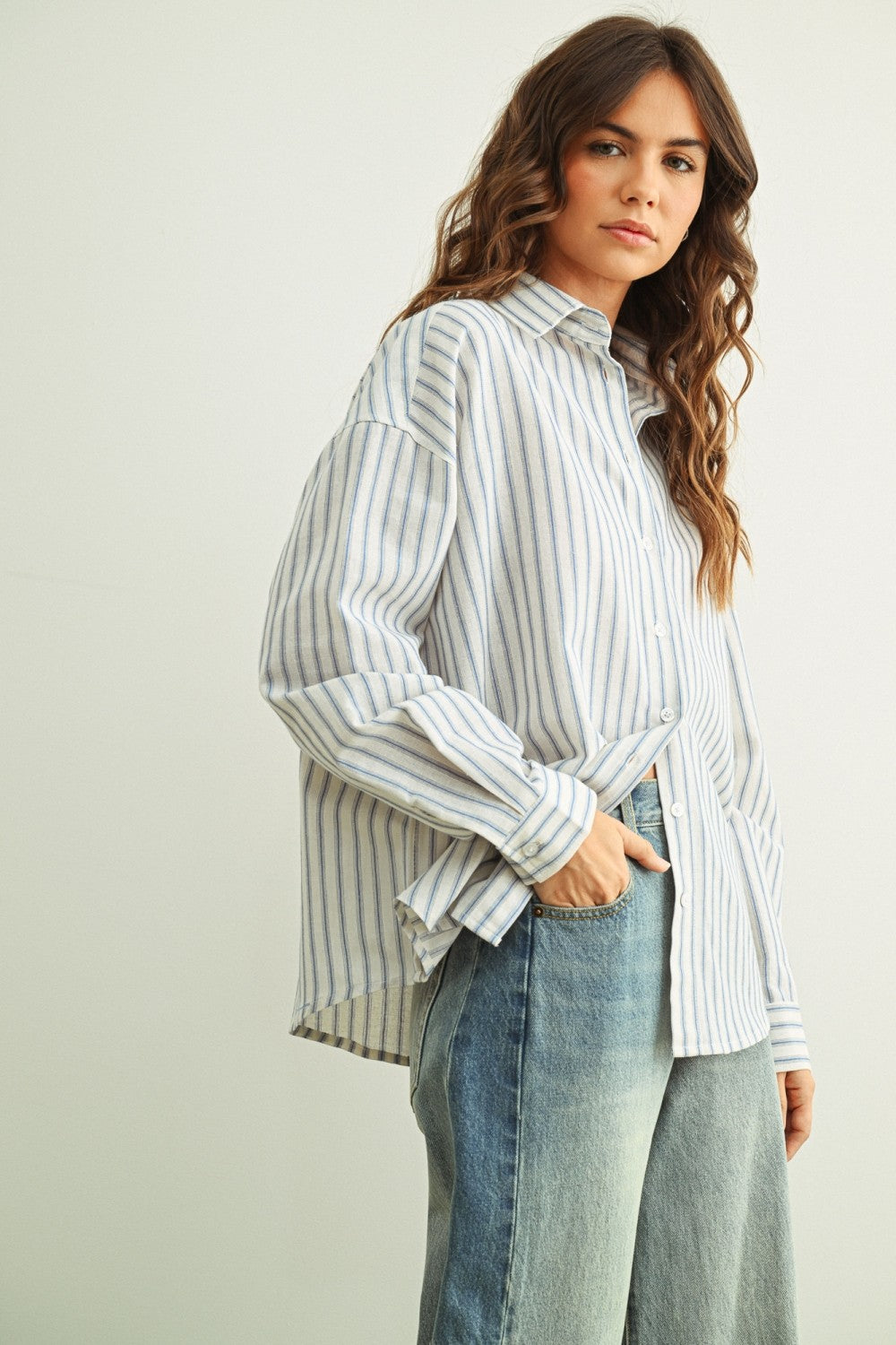 Marina blue striped button-down shirt with relaxed fit and dropped shoulders
