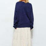 Back of Marina Fish Knit Sweater in navy — relaxed chunky knit design with ribbed cuffs and hem.
