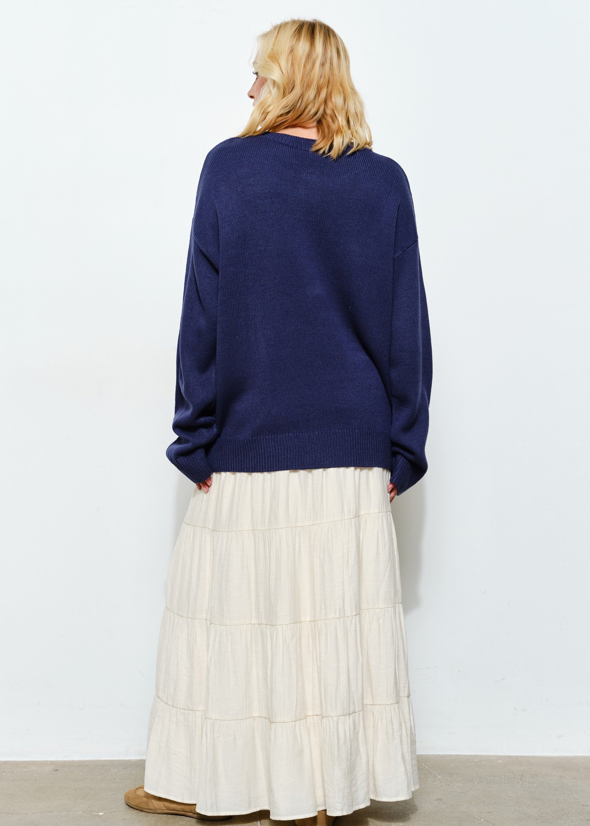 Back of Marina Fish Knit Sweater in navy — relaxed chunky knit design with ribbed cuffs and hem.