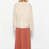 Back of Marina Fish Knit Sweater in sand — relaxed women’s chunky sweater with ribbed hem and cuffs.