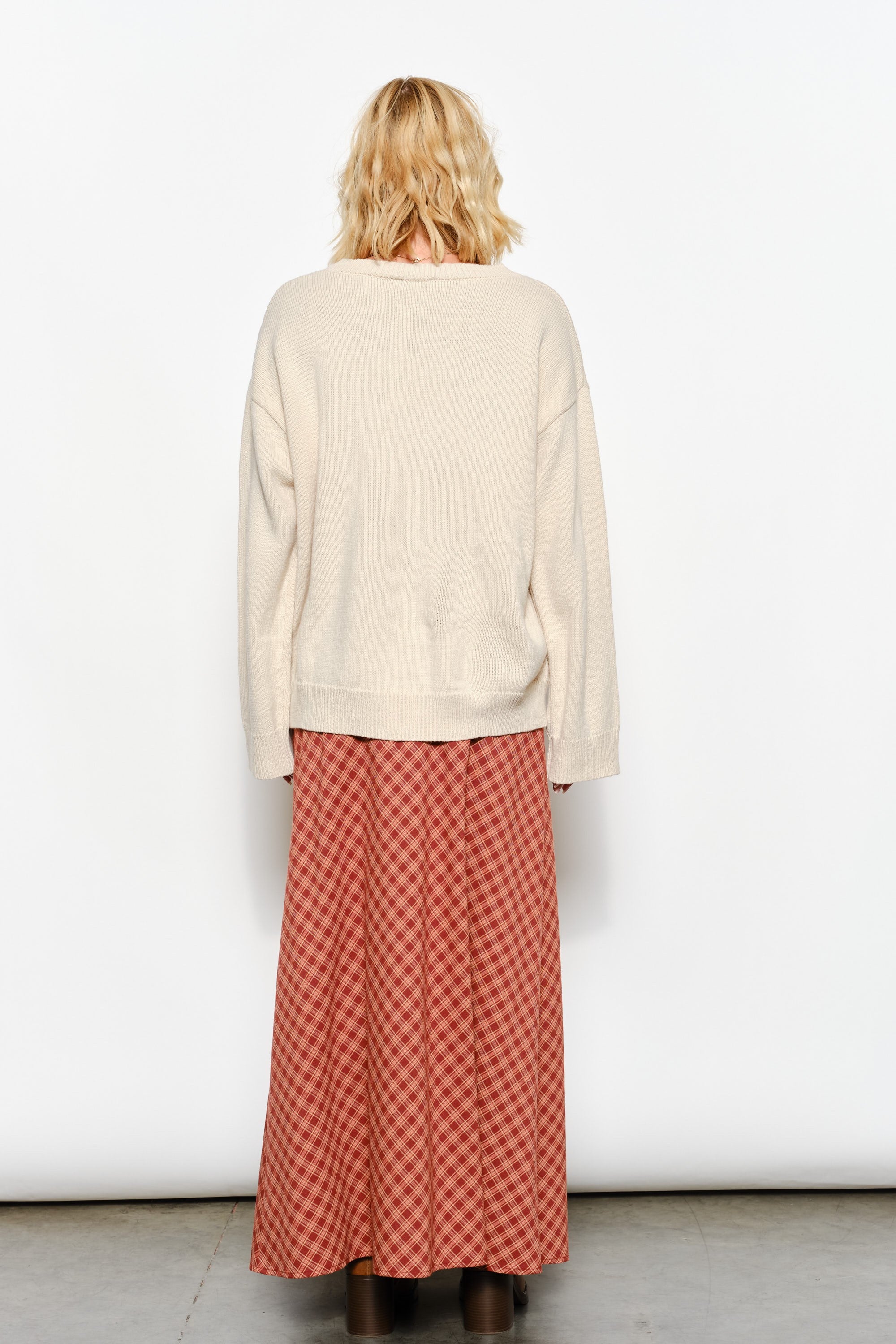 Back of Marina Fish Knit Sweater in sand — relaxed women’s chunky sweater with ribbed hem and cuffs.