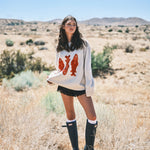 Full outfit of Marina Fish Knit Sweater in sand — relaxed women’s chunky sweater with ribbed hem and cuffs. Sardine motif.