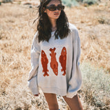 Front view of the Marina Fish Knit Sweater in sand — cozy oversized fit with soft textured knit.