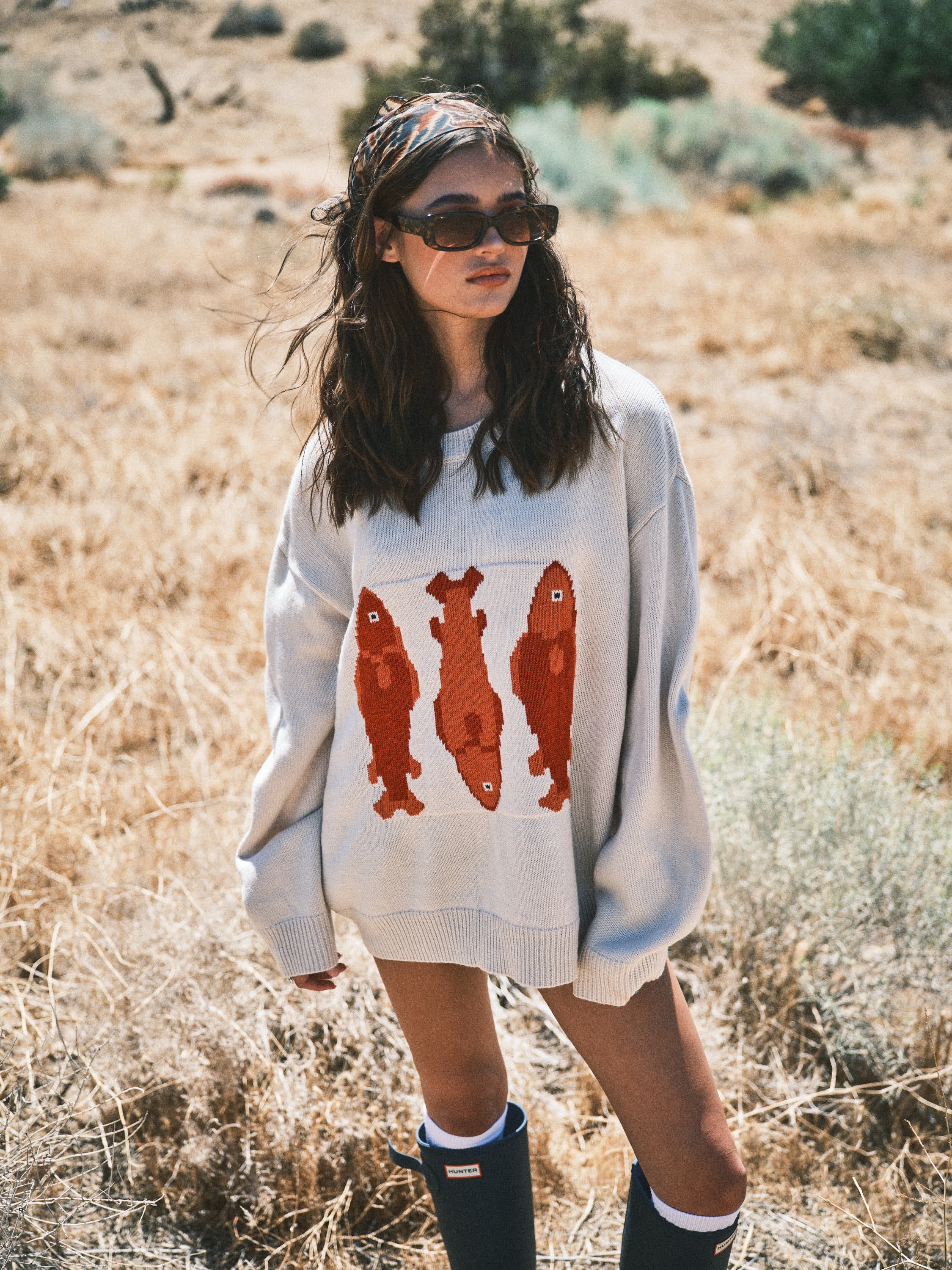 Front view of the Marina Fish Knit Sweater in sand — cozy oversized fit with soft textured knit.