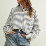 Marina navy striped button-down shirt with a relaxed fit and dropped shoulders