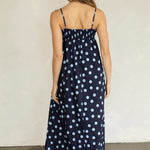 Back view of Marty Relaxed Maxi Dress in Midnight Polka Dot with stretchy smocked bodice