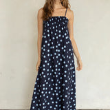 Marty Relaxed Maxi Dress in Midnight Polka Dot front view with smocked bodice and adjustable straps