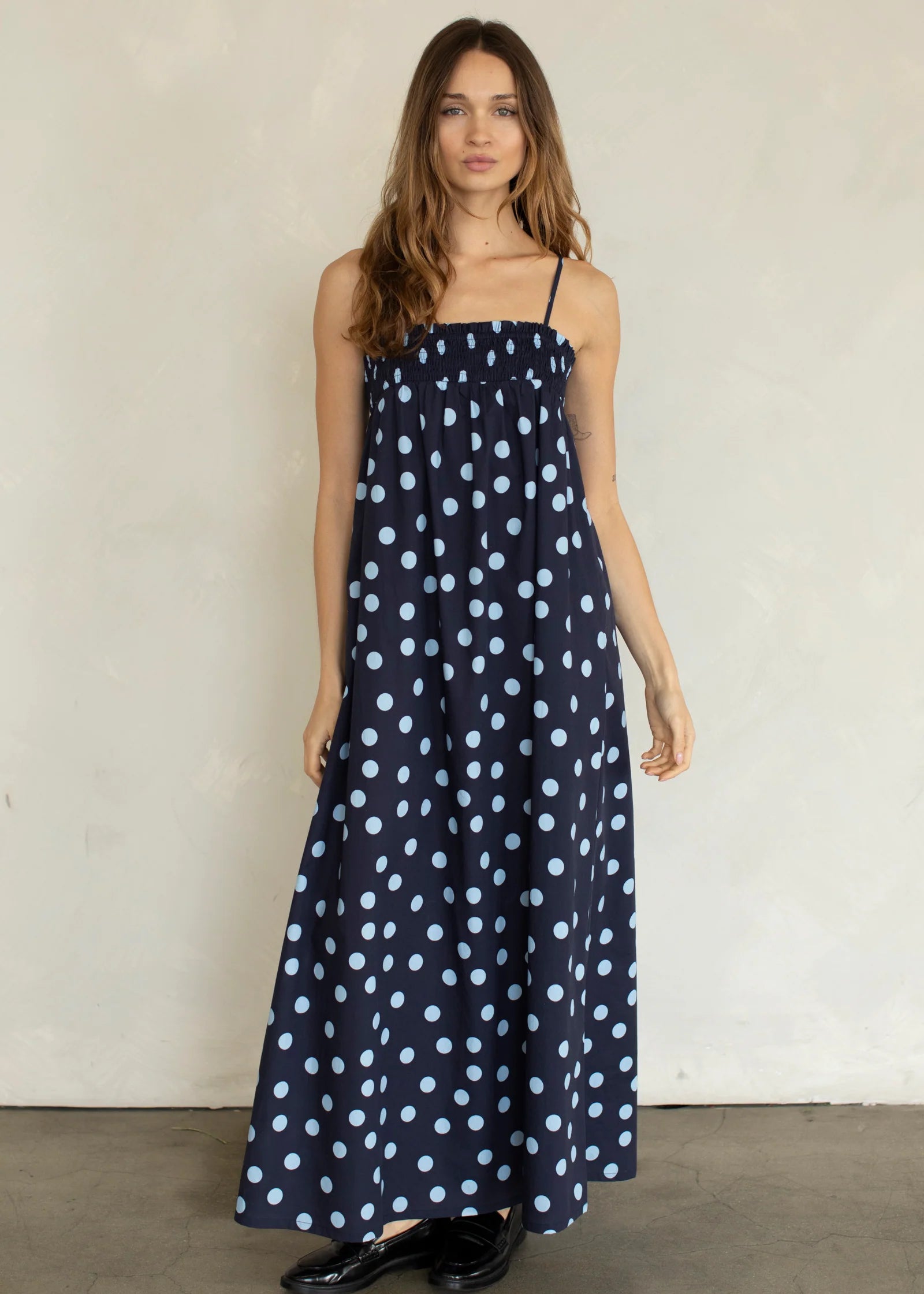 Marty Relaxed Maxi Dress in Midnight Polka Dot front view with smocked bodice and adjustable straps