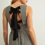 Back detail of Mila Gingham Bow Back Wide Leg Jumpsuit in Black showing bow ties