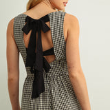 Back detail of Mila Gingham Bow Back Wide Leg Jumpsuit in Black showing bow ties